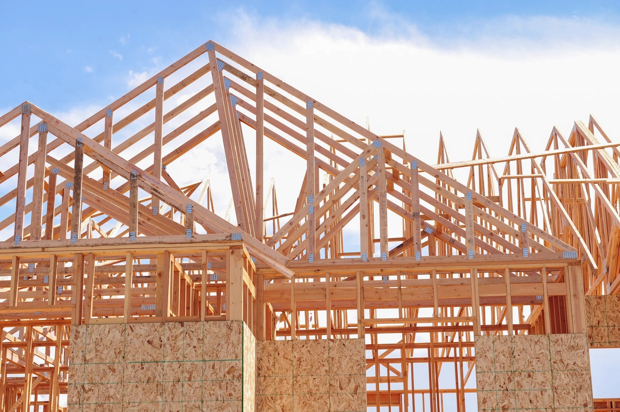 Timber frame and roof structure of a new residential home under construction