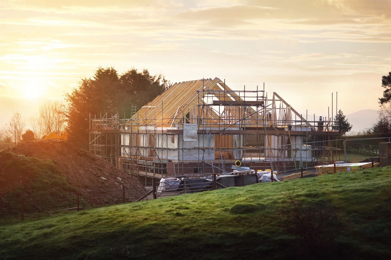Residential construction site at an early framing stage